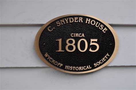 cool historic house stone and metal signs|icons for historic buildings.